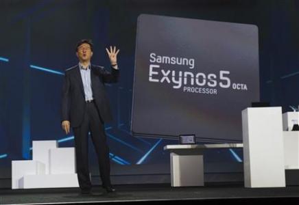 Stephen Woo, president of Device Solutions Business for Samsung Electronics, talks about the new Samsung Exynos 5 Octa processor during a keynote address at the CES in Las Vegas